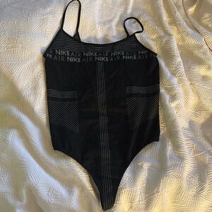 Nike air thong body suit size large